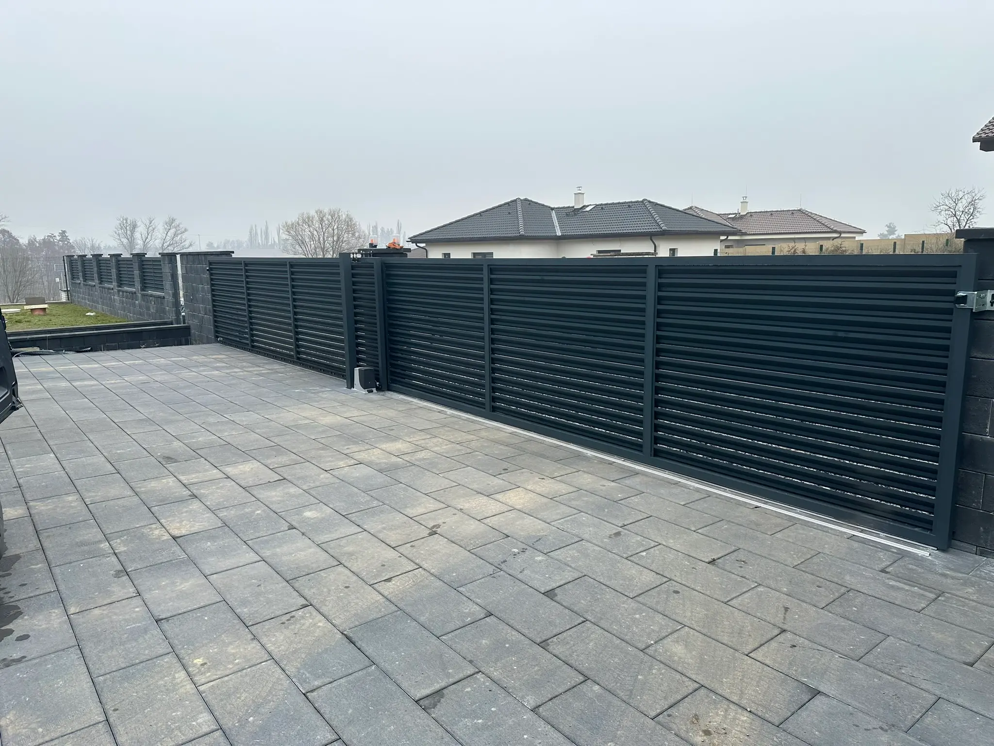 Cena za oplotenie domu